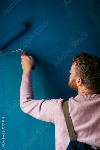 Man painting wall