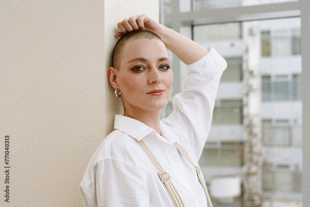 Portrait of stylish bald woman