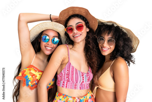 Three young women ready for summer vacations over isolated transparent background © LorenaPh