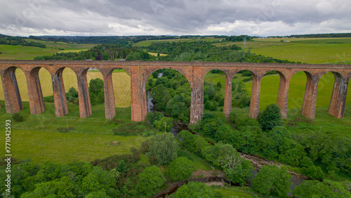 AERIAL: Beautiful overview of impressive Nairn Viaduct over wide green valley