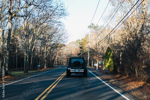 Jeep on the road in the fall