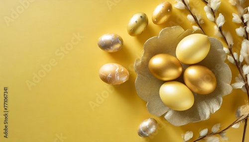 easter golden decorated eggs on yellow background minimal easter concept happy easter card with copy space for text top view flatlay