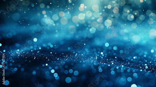 An abstract defocused background with deep blue bokeh lights, resembling a tranquil underwater scene.