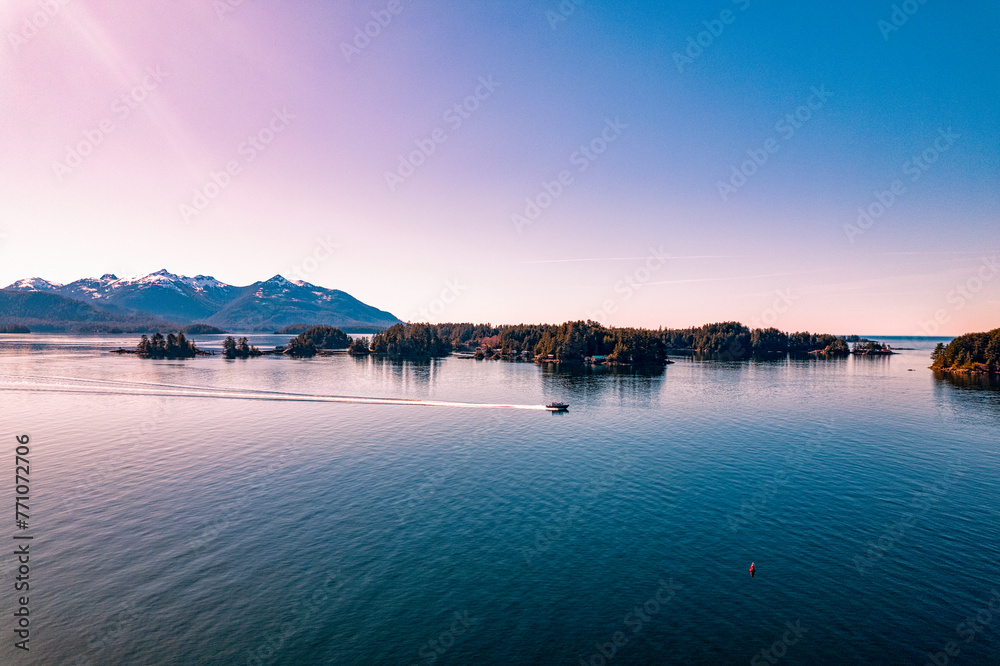 Fototapeta premium Aerial Image - Fishing Boat Racing Across the Water - Sitka, Alaska