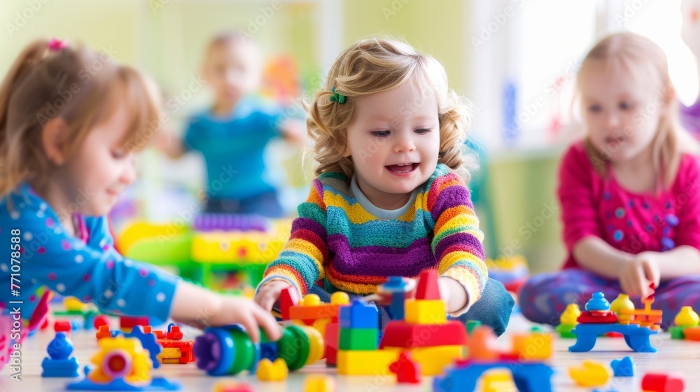 Happy toddlers playing with colorful building blocks in a bright playroom setting. Happy toddlers playing with colorful building blocks in a bright playroom setting.