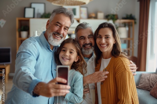Multigenerational family portrait: Captured in a joyful selfie.