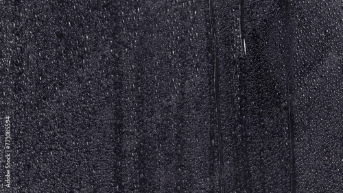 a water wet window weather transparent drip drops surface glass rain rainfall storm stormy falling condensation windshield backdrop light clear 4k motion raindrop night background