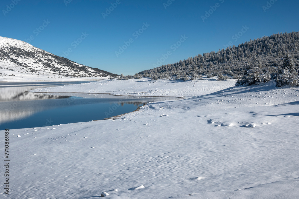 Winter view of Belmeken Dam at Rila mountain, Bulgaria