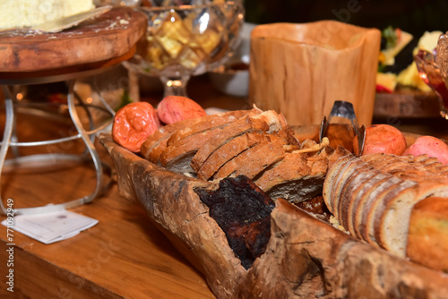 breads on a wooden table, breakfast buffet, bread tray, buffet with breads, bakery showcase, baker's day