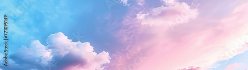 A vivid skyscape with pink and blue hues illustrating the serenity and beauty of sunrise or sunset clouds photo