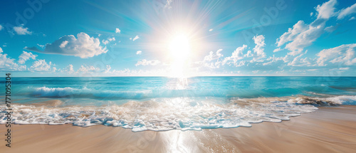 A picturesque portrayal of sun glare casting over a pristine ocean meeting a white sand beach, framed by a clear blue sky photo