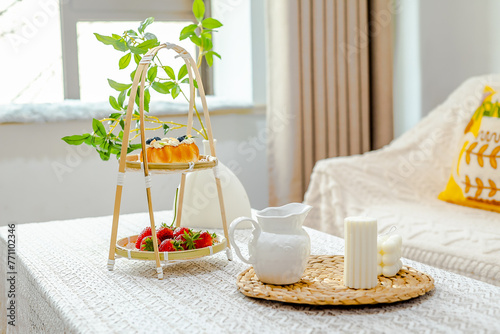 Afternoon tea with cream bread paired with strawberries and coffee
