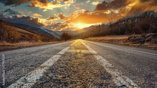 Open road at sunset leading through a scenic landscape, Concept of travel, journey, and the freedom of the open road 