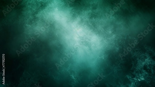 A simple, dark, and blurry green abstract background with a gradient blur effect, ideal for studio lighting designs