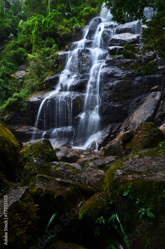 V  u da Noiva  Bridal Veil  waterfall surrounded by the lush subtropical montane rainforest of the lower sector of Itatiaia National Park  Itatiaia  Rio de Janeiro  Brazil.