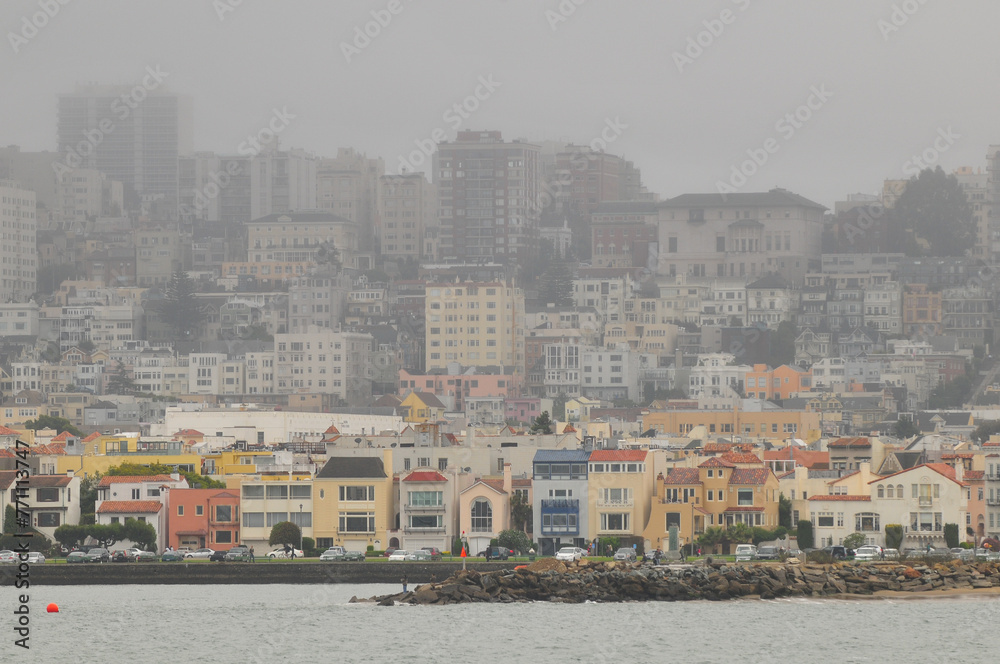 A foggy view of Pacific Heights and Marina districts from the bay, San Francisco, California, USA.