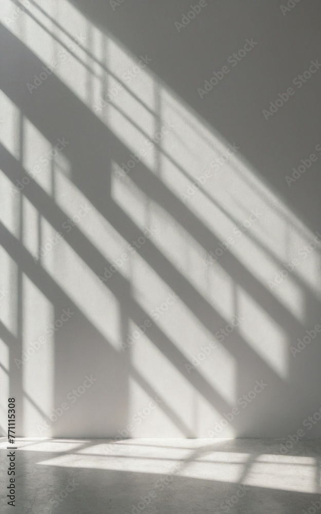 Obraz premium Authentic and understated soft-focus natural light through windows, casting shadows on textured wallpaper, creating an abstract backdrop. Simplistic abstract white light background ideal for product 