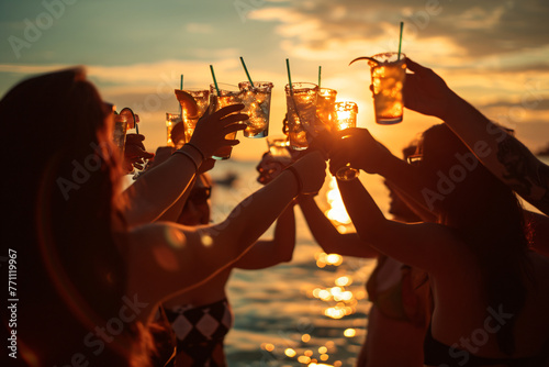 group of people holding up margarita and celebrating in 73535a83-8f70-42b5-905f-f6f012086d78 photo