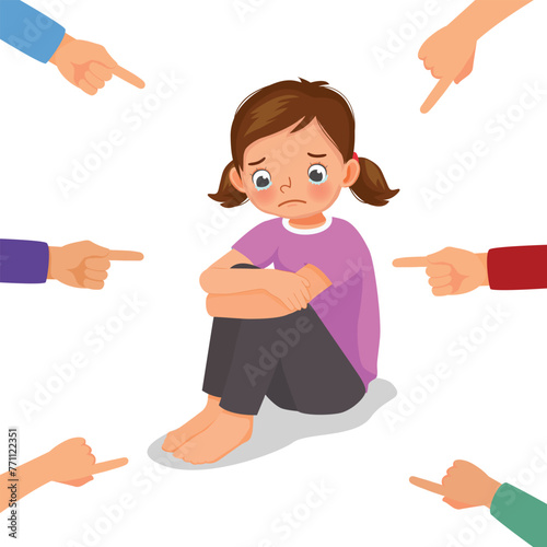 Sad little girl crying being bullied with with finger surrounding pointing at him