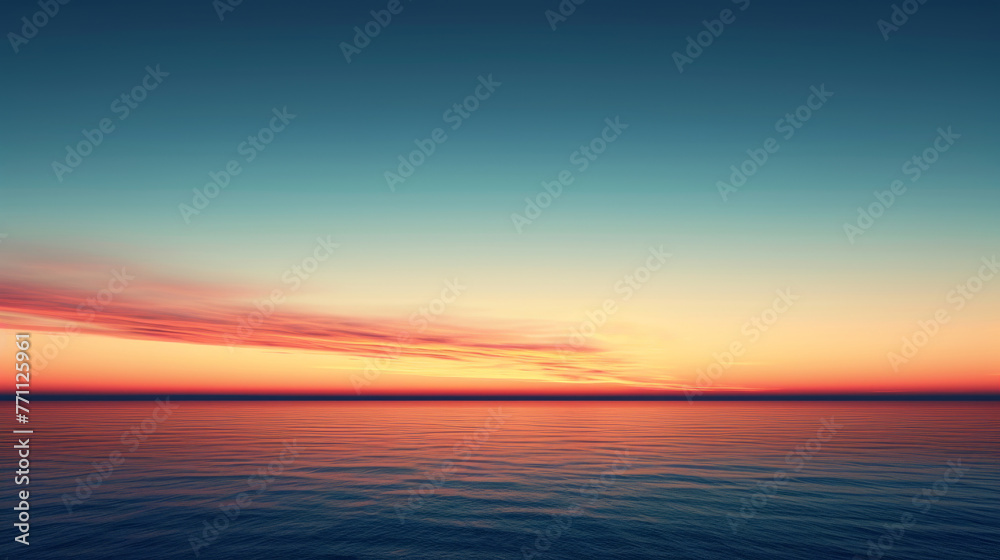 A beautiful sunset over the ocean with a calm and peaceful mood