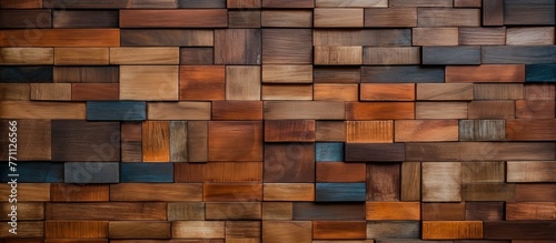 A closeup of a brown wooden wall constructed with rectangular wooden blocks  showcasing the hardwood flooring material. The wood stain enhances the brick pattern of the wall