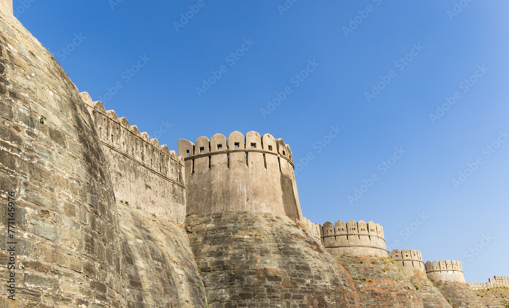 ancient fort exterior wall ruins with bright blue sky at morning