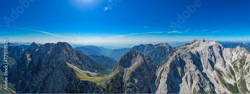 Grintovec and Storžič mountains in Slovenia - Aerial view above the beautiful mountains and hiking trail in Slovenia