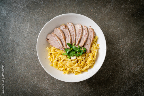 Photography dried duck noodles in white bowl