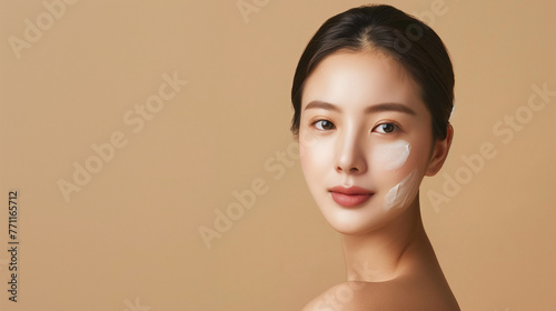 Beautiful young asian woman with clean fresh skin on beige background, Face care, Facial treatmentA mysterious woman dons a striking white mask, concealing her identity and exuding an aura of intrigue