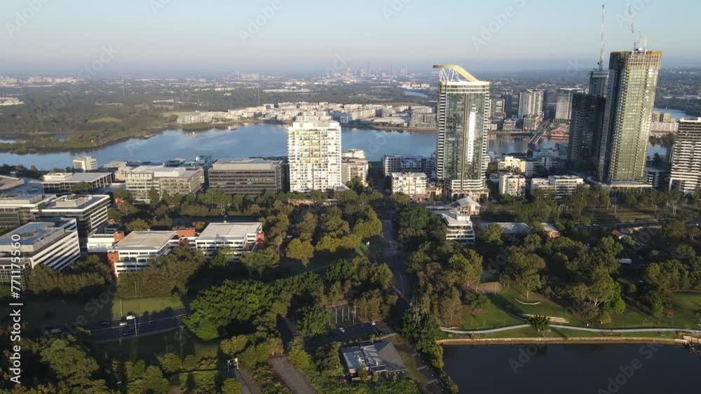 Aerial drone view of Rhodes, an Inner West suburb of Sydney, and Homebush Bay, NSW Australia on a sunny morning in March 2024 Aerial drone view of Rhodes, an Inner West suburb of Sydney, and Homebush Bay, NSW Australia on a sunny morning in March 2024