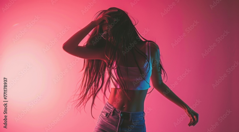 Silhouette of Woman Dancing in Pink Neon Light. Silhouette of Woman Dancing in Pink Neon Light.