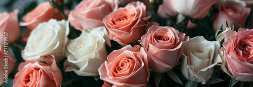pink and white roses were placed in a bouquet in the st 195aa38b-ded9-4f22-a17d-216ced7ad1ca photo