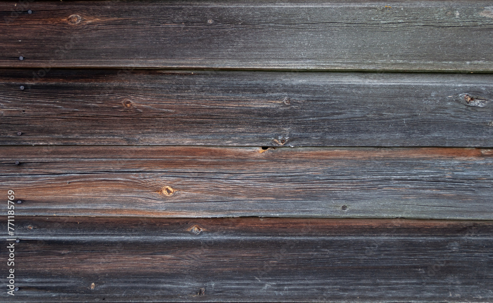 Texture of old weathered natural dark wooden wall Texture of old weathered natural dark wooden wall