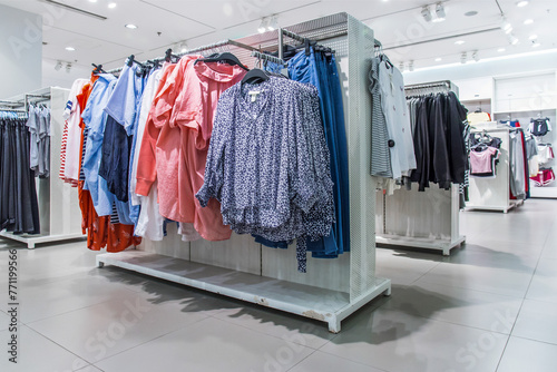 Various shop clothing in ladies' clothing store in summer 