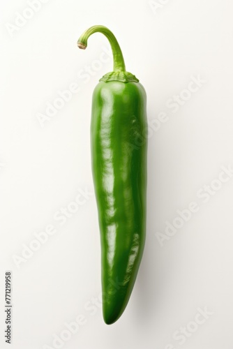 One green child pepper on white background.