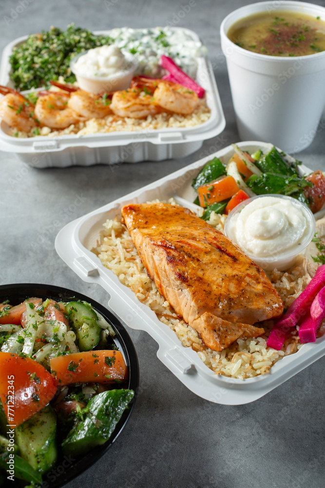 A view of several Mediterranean entrees.