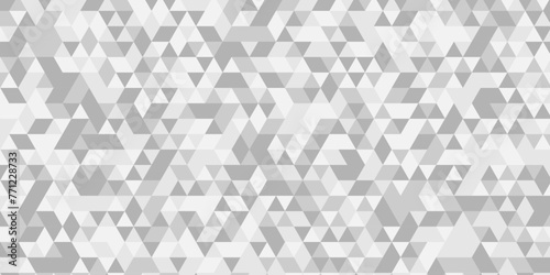Gray and white polygonal mosaic background. Seamless geometric pattern square shapes low polygon backdrop background.	
