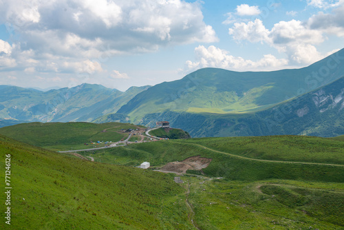 Sublime Outlook: Green Mountains Set Against Azure Skies