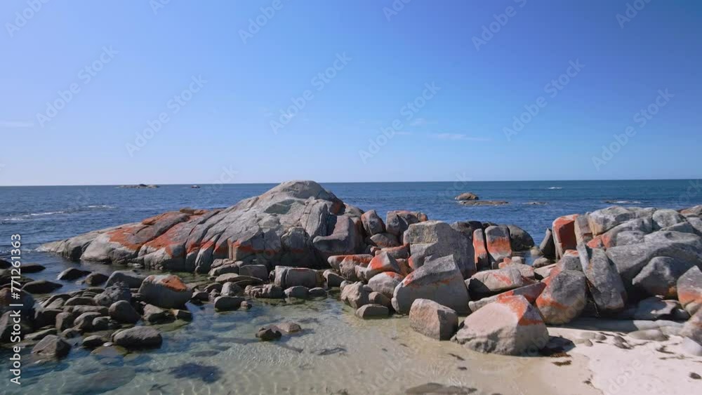 Beautiful Bay of Fires granite rock coastline on sunny day in Tasmania, Australia Beautiful Bay of Fires granite rock coastline on sunny day in Tasmania, Australia