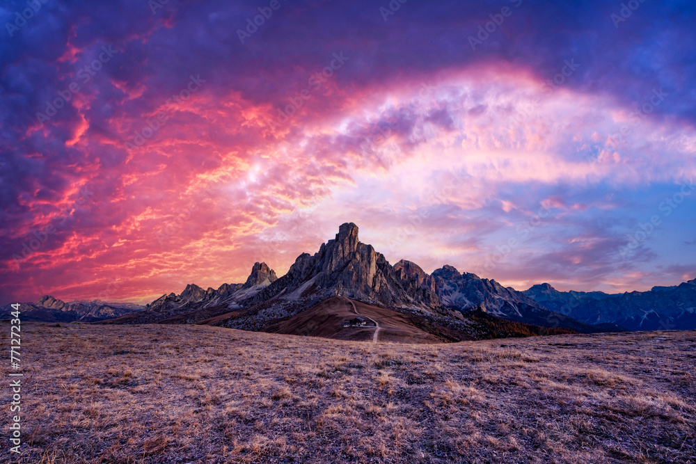 Picturesque landscape during incredible pink sunset in Italian Dolomites