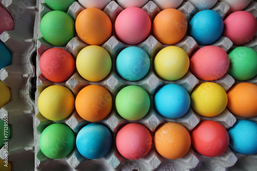colorful eggs in large carton © Chiara Sakuwa