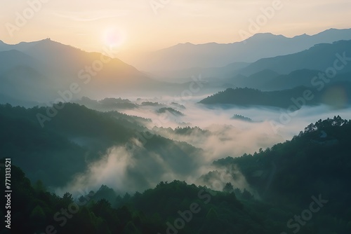   A serene mountain landscape at dawn  with fog lifting as the sun rises  in a time-lapse sequence