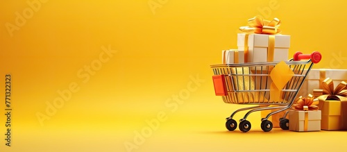 A close-up view of a shopping cart filled with presents, showcasing a variety of gift items for a retail shopping theme on a vibrant yellow background