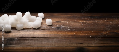 Several sugar cubes are spr...