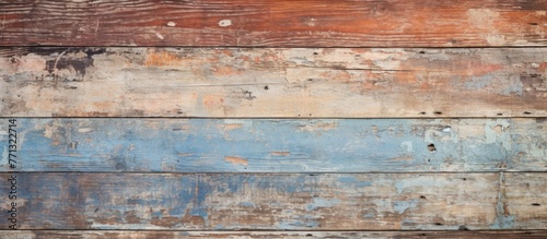Vintage wooden background showcasing a colorful and chipped paint job  adding charm and character to the aged surface