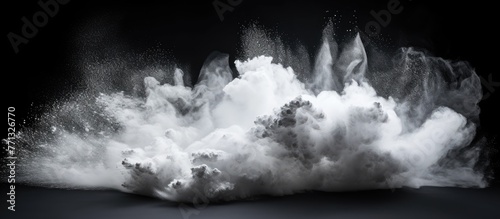A white powder cloud disper...