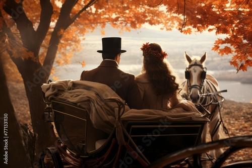 Couple enjoying a romantic horse-drawn carriage ride in autumn © Michael Böhm