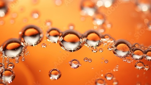 Macro Shot of Water Droplets with Reflections on an Orange Surface.