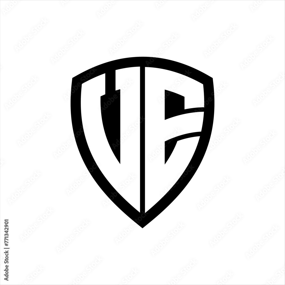 VE monogram logo with bold letters shield shape with black and white color design VE monogram logo with bold letters shield shape with black and white color design