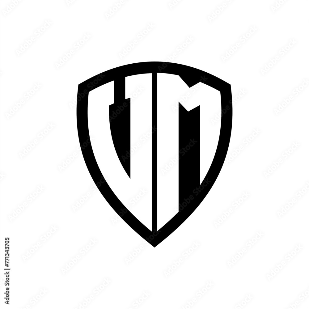 VM monogram logo with bold letters shield shape with black and white color design VM monogram logo with bold letters shield shape with black and white color design